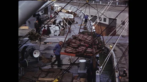 Cargo Lowered ontop Ship Video stock 47644162