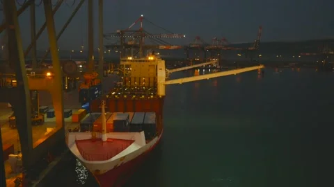 Cargo operations on small container ship. Stock Footage 155675546