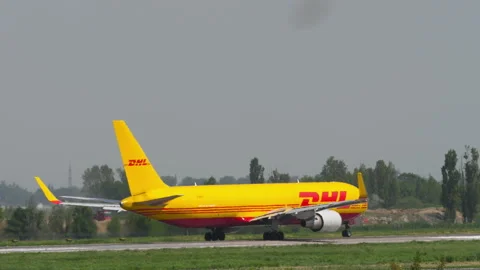 Cargo plane DHL on the runway Stock Footage 304537427