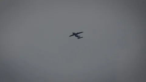 Cargo Plane Long Shot Dark Clouds 1080 스톡 동영상 129070233