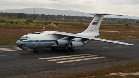 Cargo plane moving on the runway. Drone view. Central African Republic Bangui Stock Footage 185904781