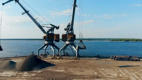 Cargo port with two loaders working in it Stock Footage 119009769