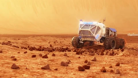The cargo rover is moving on the surface of Mars. Starship in the background. 4K Stock Footage