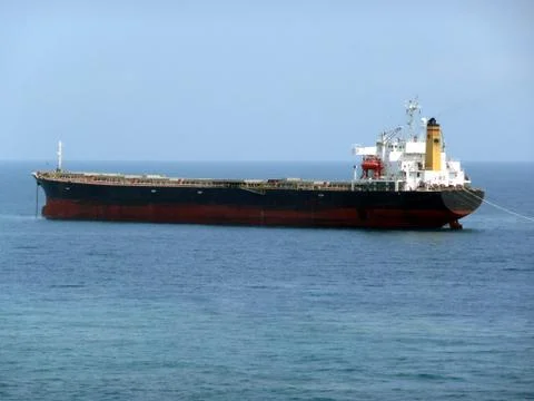 Cargo ship at anchor Stock Photos