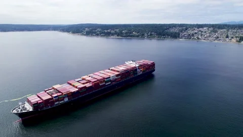 Cargo Ship Anchored in Bay Stock Footage 159376327