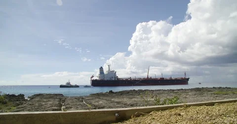 Cargo Ship Anchored Off Shore Stock Footage 80295673