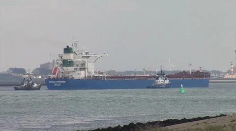 Cargo ship and 2 tuc boats Stock Footage 8548069