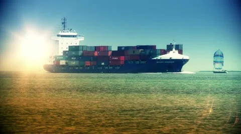 Cargo ship and boat at sundown Stock Footage 20486754