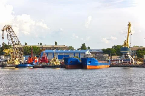 Cargo ship and crane. Container terminal. for delivery and transportation. In Stock Photos