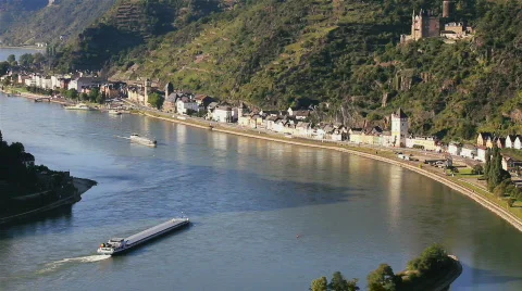 Cargo ship and cruise ship on the river Stock Footage