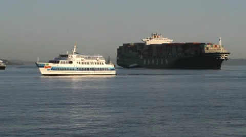 Cargo Ship and Ferry on Bay Stock Footage 12033933