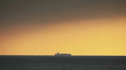 Cargo ship and sea at sunset Stock Footage 10792487