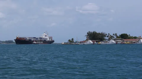 Cargo ship and us coast guard station Stock Footage 24708999