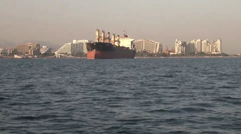 Cargo ship on the background of the city Stock Footage 23414211