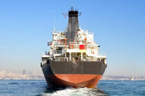 Cargo ship from the backwash Stock Photos