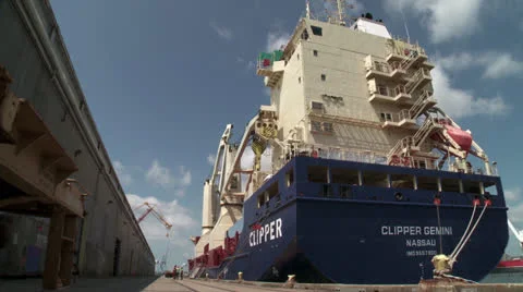 Cargo Ship Being Unloaded - Time lapse Stock Footage 25426539