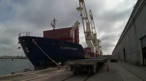 Cargo Ship Being Unloaded - Timelapse Stock Footage 25454122