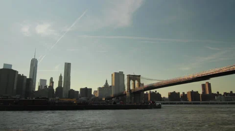 Cargo Ship Beneath Brooklyn Bridge - Manhattan Skyline in BG Stock Footage 37106940