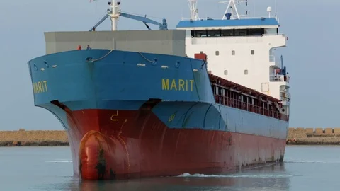 Cargo ship berthing in small port Stock Footage 108635298