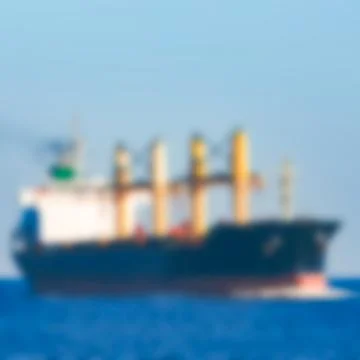 Cargo ship - blurred image Stock Photos
