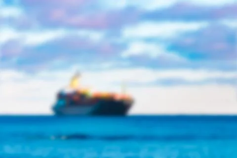 Cargo ship - blurred image Stock Photos