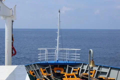 Cargo Ship Bow Navigating Across Calm Open Seas Фото
