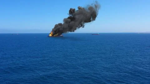 Cargo ship burning on fire with large scale smoke-Aerial Stock Illustration