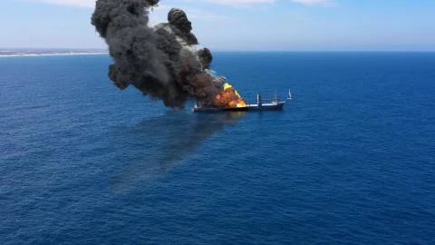 Cargo ship burning on fire with large scale smoke-Aerial Stock Illustration
