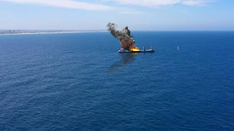 Cargo ship burning on fire with large scale smoke-Aerial Stock Illustration