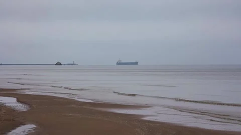 Cargo Ship on Calm Winter Sea Stock Footage 325673605