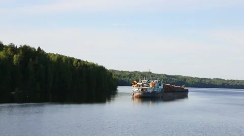 Cargo ship with a cargo of timber on the Svir River Stock Footage 68241825