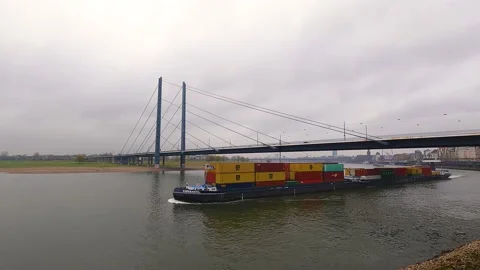 Cargo Ship Crossing Rhine River from Dusseldorf Bridge: Stunning View Stock Footage 234349117