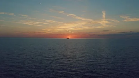Cargo Ship Crossing the Sunset Horizon Over the Mediterranean Sea Stock-Footage 336683169