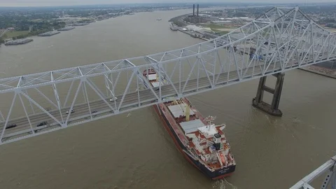 Cargo Ship Crossing Under Crescent City Connection Bridge in New Orleans Stock Footage 128393219
