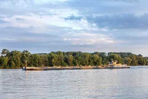 Cargo ship crusing down the river Rhine Stock Photos