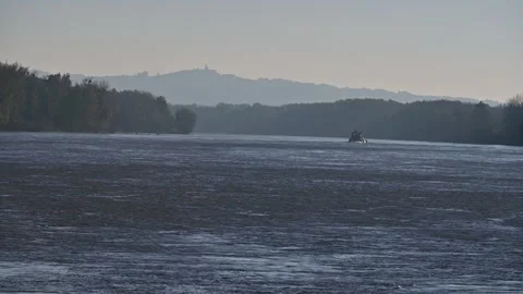 Cargo ship on the danube river in wallsee Stock Footage 294187923