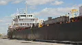 Cargo ship at dock. Timelapse. HD Footage
