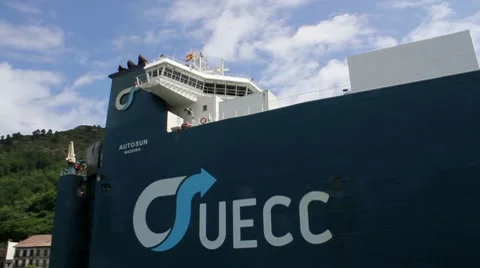 Cargo ship entering port Stock Footage 7848024