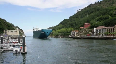 Cargo ship entering port Stock Footage 7877019