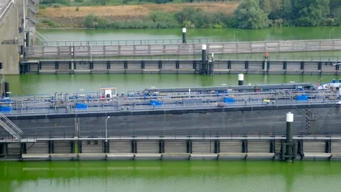 Cargo ship exits the Krammer locks, in The Netherlands. Vídeo Stock 275263873