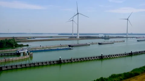 Cargo ship exits the Krammer locks, in The Netherlands. Stock Footage 275284403