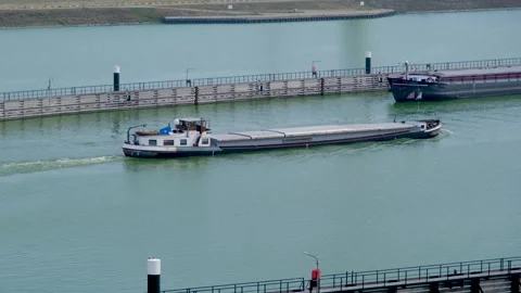 Cargo ship exits the Krammer locks, in The Netherlands. Видео 275340540