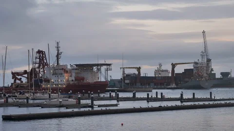 Cargo Ship Filled With Shipping Containers Leaving Harbor, Ponta Delgada, Azores Stock Footage 90532210