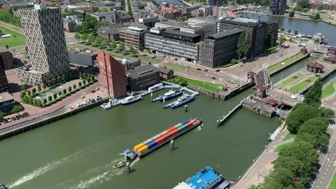 Cargo ship is going in the New Meuse (the Nieuwe Maas) river locks. Rotterdam. Stock Footage 145024816