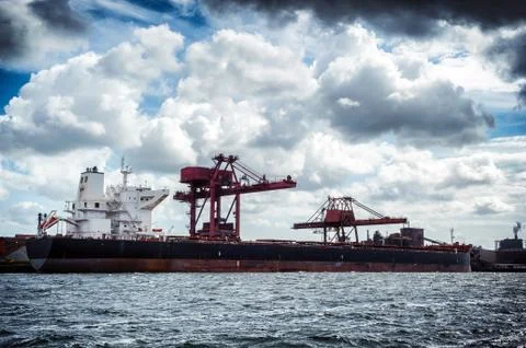 Cargo ship in harbor Stock Photos