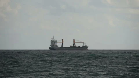 Cargo ship on the horizon Stock Footage 43967230