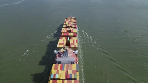 Cargo ship on Hudson river. camera flyby over a container ship Stock Footage 240689121
