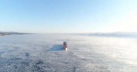 Cargo Ship on Lake Superior in Winter - Sea Smoke - Aerial View Stock Footage 99965687