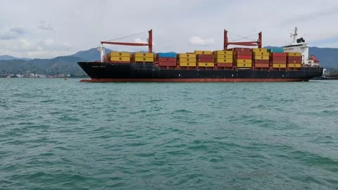 Cargo ship leaves port Stock Footage 239320089