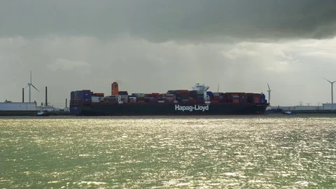 Cargo ship leaving the harbour Stock Footage 70515411